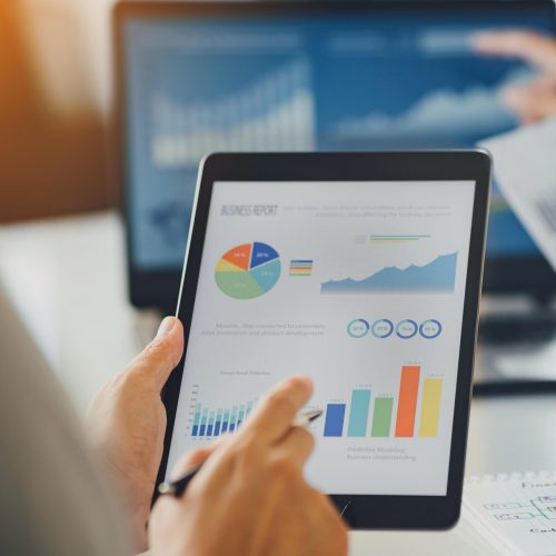two-businessman-investment-consultant-analyzing-company-annual-financial-report-balance-1